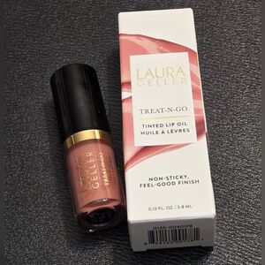 Laura Geller Treat-N-Go Tinted Lip Oil in Victory Lap (Pale Shell-Pink)